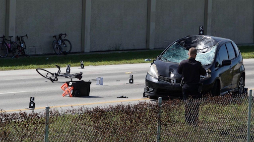 distracted driver hits a group of bicyclist, killing one, injuring five